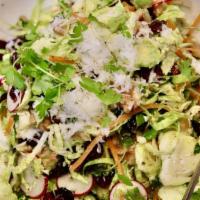 Brussel Sprout Salad · shaved brussel sprouts, radish, carrots, celery, graviera cheese,
walnuts, dried cranberries...