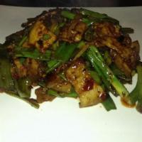 Spicy Double Cooked Pork · Spicy. Sliced belly pork and scallion sautéed in Szechuan style spicy brown sauce.