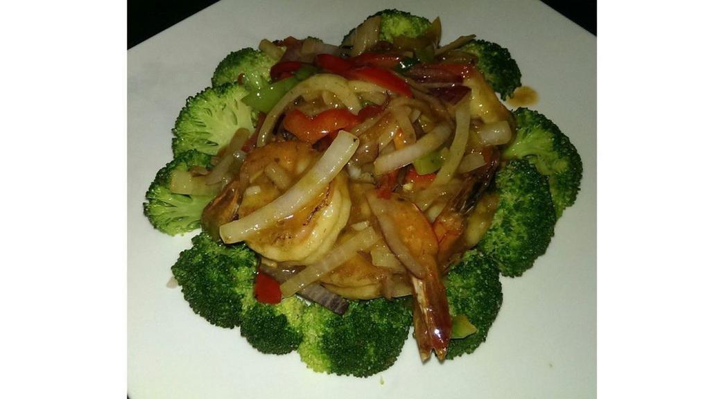 Spicy Tasty Prawn · Sautéed prawns served with bell peppers and onion, in our red spicy and tasty sauce on steamed broccoli.