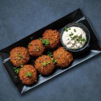 Funky Falafel (6 Pcs) · Deep-fried balls made of chickpeas, fava beans, or sometimes both chickpeas and fava beans t...