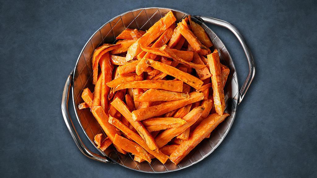 Yam Frizzles · Sweet potatoes evenly cut and then fried till crisp and golden topped with sea salt, garlic powder, and peppers.