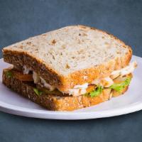 Chicken Sandwich Coop · Crispy chicken breast patty with garden fresh green lettuce and fresh tomatoes served with m...