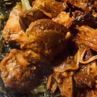 Trinidadian Stewed Chicken · Prepared in a caramelized gravy this caribbean traditional dish perfect for everyone.