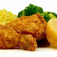 Quarter Dark Crispy Meal · 2pc dark crispy chicken (leg & thigh) served with 2 side dishes and cornbread.