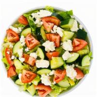 Mediterranean Salad · Romaine lettuce, tomato, and cucumber salad, feta cheese, and balsamic vinaigrette topped.