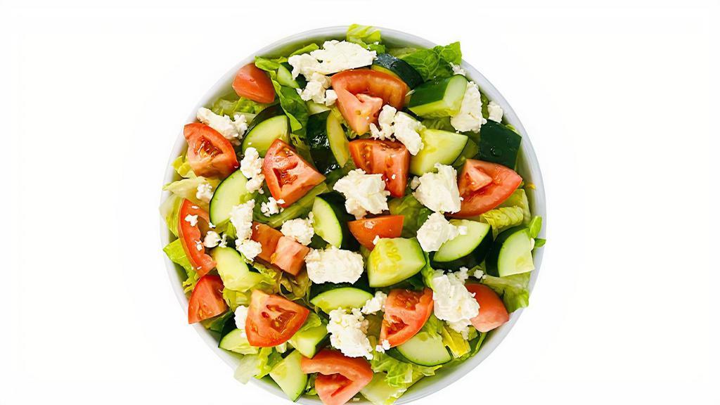 Mediterranean Salad · Romaine lettuce, tomato, and cucumber salad, feta cheese, and balsamic vinaigrette topped.