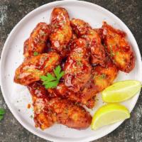Chipotle Sweet Glaze Wings · Fresh chicken wings, fried until golden brown, and tossed in honey chipotle sauce. (Medium S...