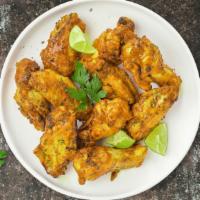 Pepper Zinger Wings · Fresh chicken wings, fried until golden brown, and tossed in a dry rub of lemon pepper.