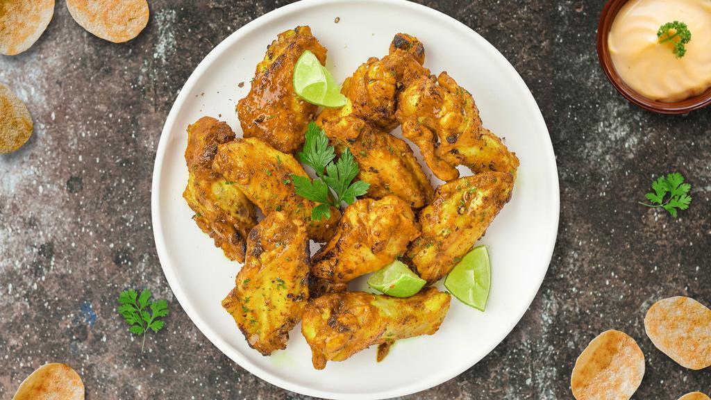 Pepper Zinger Wings · Fresh chicken wings, fried until golden brown, and tossed in a dry rub of lemon pepper.