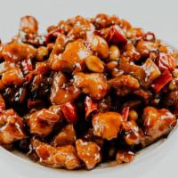 Kung Pao Chicken / 宮保雞丁 · The delicious American-Chinese style chili sauce, served with your choice of rice.