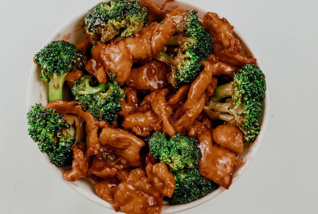 Beef & Broccoli / 芥蘭牛肉 · Sliced beef filets, broccoli, savory brown sauce, served with rice of your choice.