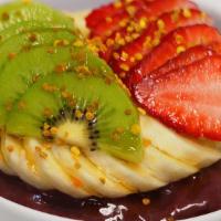 Warrior Acai Bowl · Blend: organic Açai blends w/strawberries, local 
banana, and organic apple juice.  
Topping...