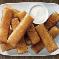 Cinnamon Sticks (10) · Sprinkled with cinnamon and sugar and served with an icing dipping sauce. 80 cal. per stick.