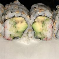 California Roll · Kani, cucumber, and avocado, rice outside.