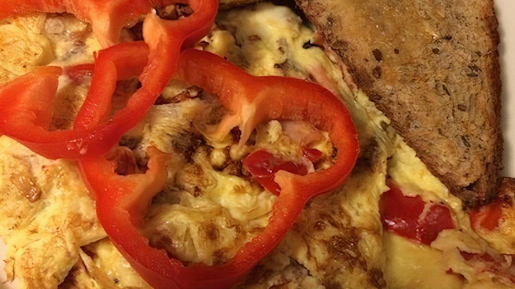 The Chili Omelette · Red peppers, tomatoes, onions, crushed red pepper and American cheese.