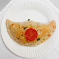 Calzone · Salami, ham or vegetables, mozzarella, ricotta and parmesan or pecorino cheese, as well.