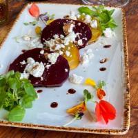 Beet Salad · Red Beets, Organic Mixed Greens, Goat Cheese, EVOO.