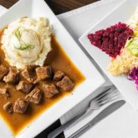 Beef Goulash · Hearty meat stew flavored with our own recipe of freshly ground spices. Served with house sa...