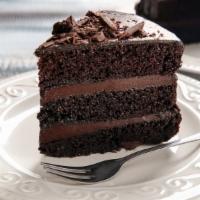 Royal Dark Chocolate Layer Cake · Dense and moist chocolate cake.