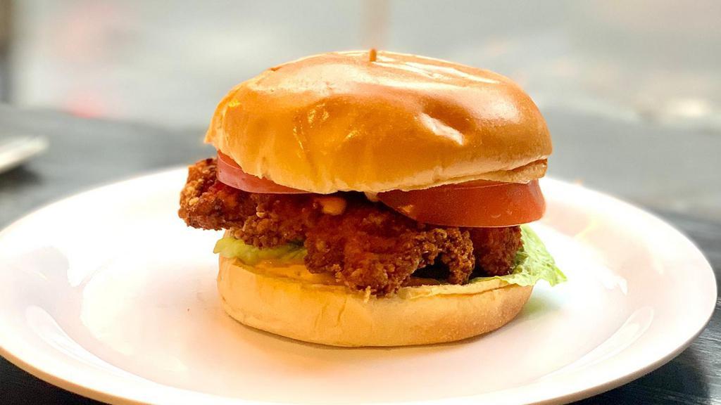 Frank'S Hot Sauce Fried Chicken Sandwich · Breaded Chicken Breast on a bun with tomato, lettuce and hot sauce sauce