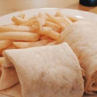 Buffalo Chicken Cheese Steak Wrap · Chicken, American Cheese with hot sauce and blue cheese.