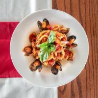 Linguine Alla Pescatore · A mixture of fresh seafood, shrimp, calamari, mussels and clams in marinara sauce.