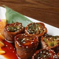 Beef Negimaki · Beef and Scallions rolled with teriyaki sauce.