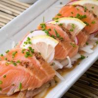 Salmon Tataki · A quickly seared salmon, thinly sliced sashimi style and served with a delicious citrus ponz...