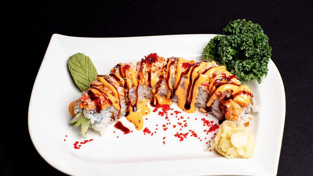 Dynamite Roll · Cooked spicy fish on top, spicy tuna inside.