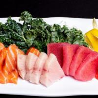  Trio Sashimi · 4 pieces tuna 4 pieces salmon and 4 pieces yellowtail.