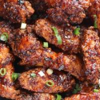 Korean Style Chicken Wings · Your choice of spicy or soy garlic flavor