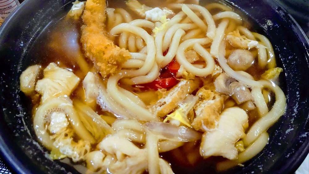 Nabeyaki Udon · Udon noodle soup with vegetables, tempura & egg.