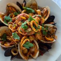 Seafood Combo · Shrimp, clams, mussels, calamari and scallops.
