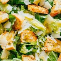 Caesar Salad · Crisp romaine tossed with croutons, Caesar
dressing, and grated cheese.