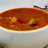 Manhattan Clam Chowder · Packed with clams in a rich tomato broth.