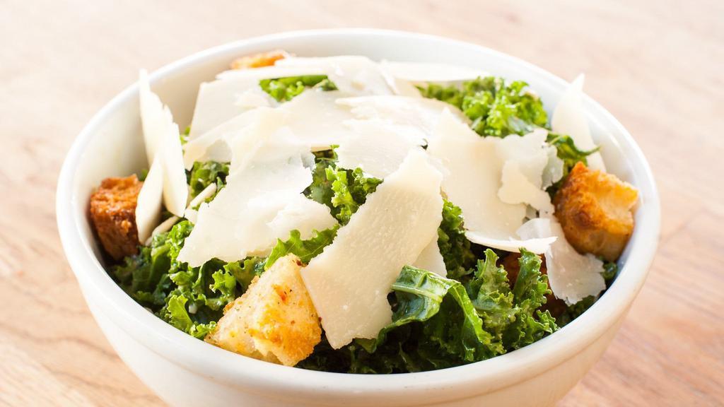 Insalata Kale Caesar · Kale salad, shaved parmesan cheese and croutons in a homemade caesar dressing.