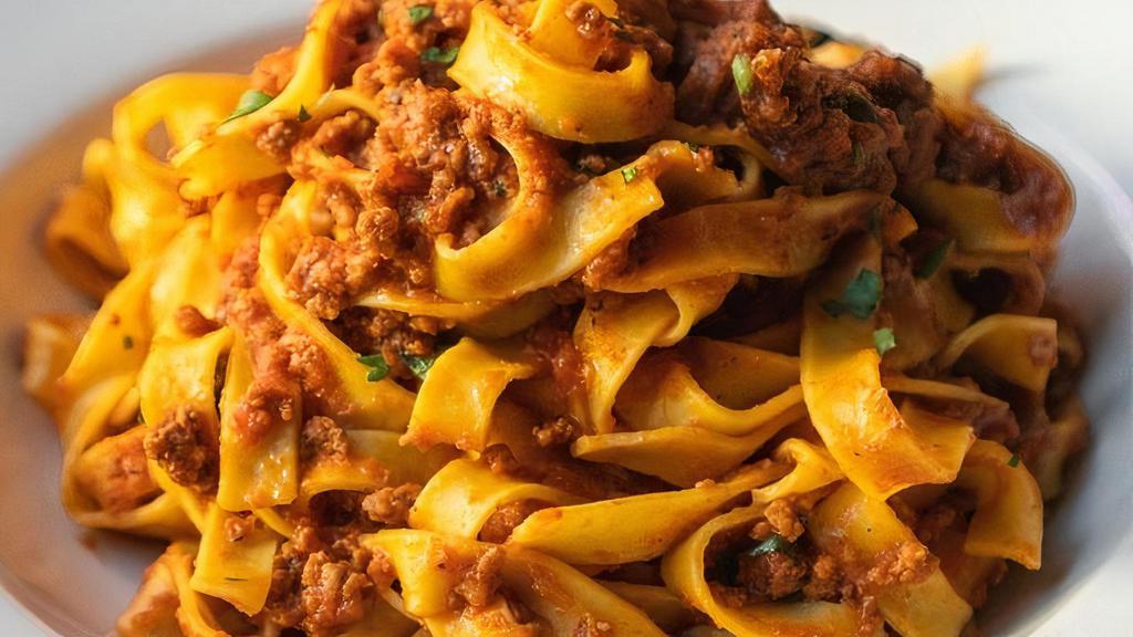 Tagliatelle Al Ragu · The classic Italian Bolognese (beef ragu) with homemade pasta.