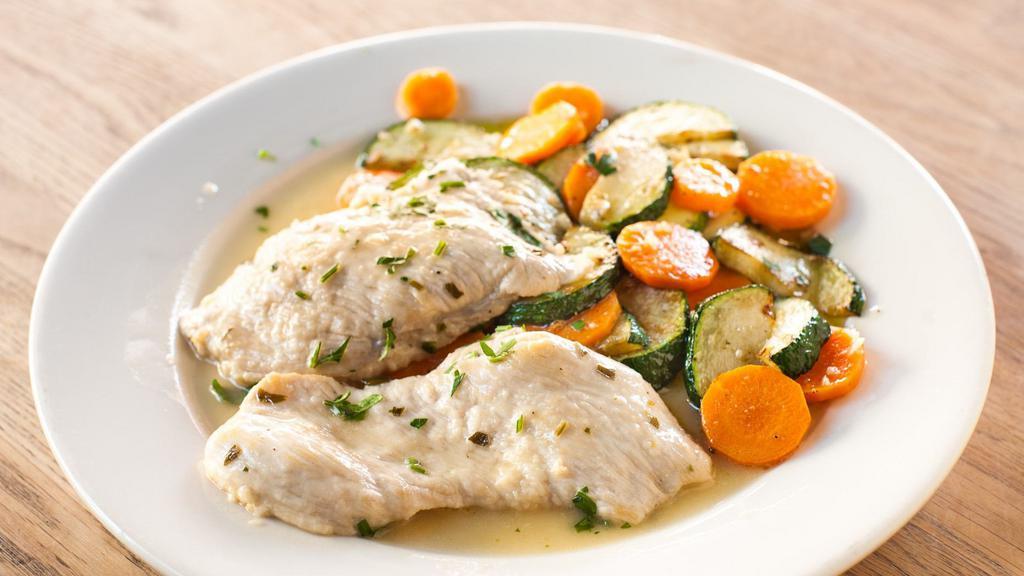 Pollo Al Limone · Sauteed chicken breast in lemon sauce served with sauteed zucchini and carrots.