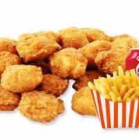 Popcorn Chicken Combo · With french fries and free can of soda.