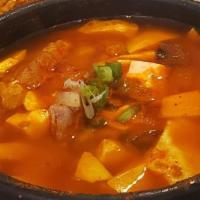Kimchi Stew · Spicy kimchi stew with pork, tofu, rice cake.