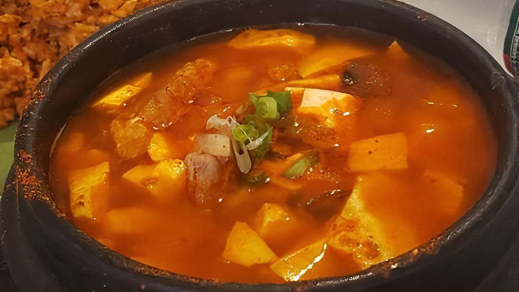Kimchi Stew · Spicy kimchi stew with pork, tofu, rice cake.