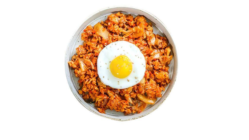 Kimchi Fried Rice · Kimchi fried rice with scrambled egg and fried egg on top