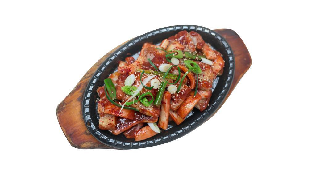 Squid & Pork Stir Fry · Stir fried squid and pork belly with vegetables.