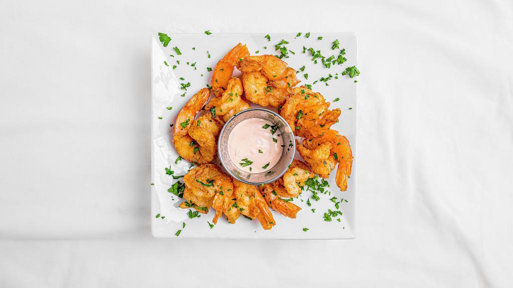 Sake Pase Shrimp · Kreyol seasoned shrimp and fried to golden perfection.