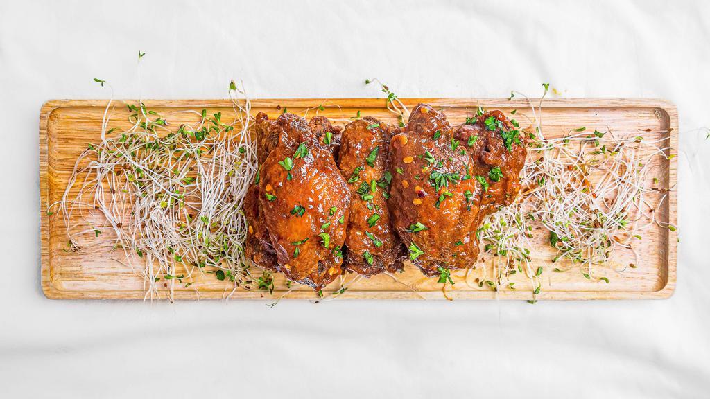 Rebel Wings · Signature dry wings tossed in your choice of savory sauce.