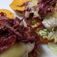New Yorker · Hot pastrami, melted Swiss cheese, lettuce & tomato.