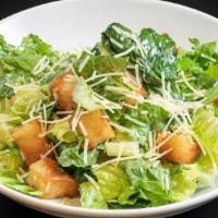 Caesar Salad · Caesar salad with house made dressing and croutons.