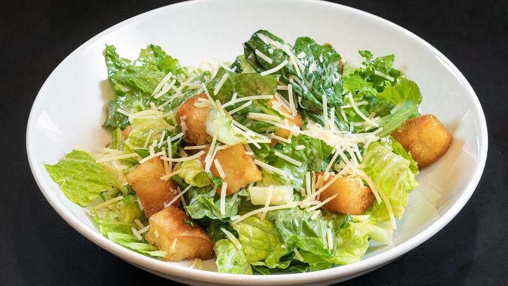 Caesar Salad · Caesar salad with house made dressing and croutons.