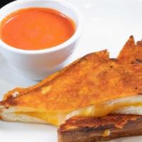 Grilled Cheese With Side · Grilled cheese with a choice of Hookd fries or a cup of our pan roast base for a side.