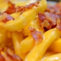 Bacon Cheese Fries · Traditional fresh cut french fries covered in melted cheese and crispy bacon.